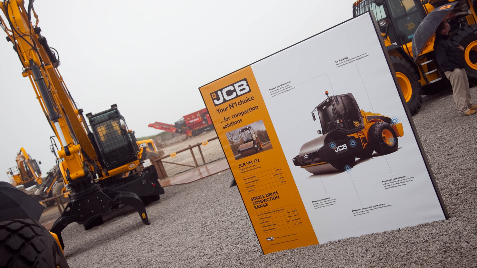 jcb machinery outside with an informative sign