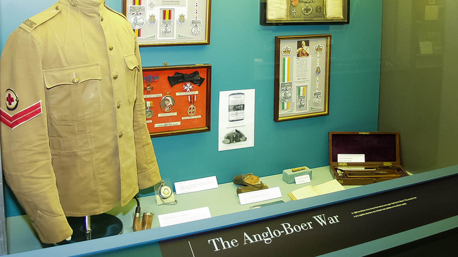museum display of army medals and uniform