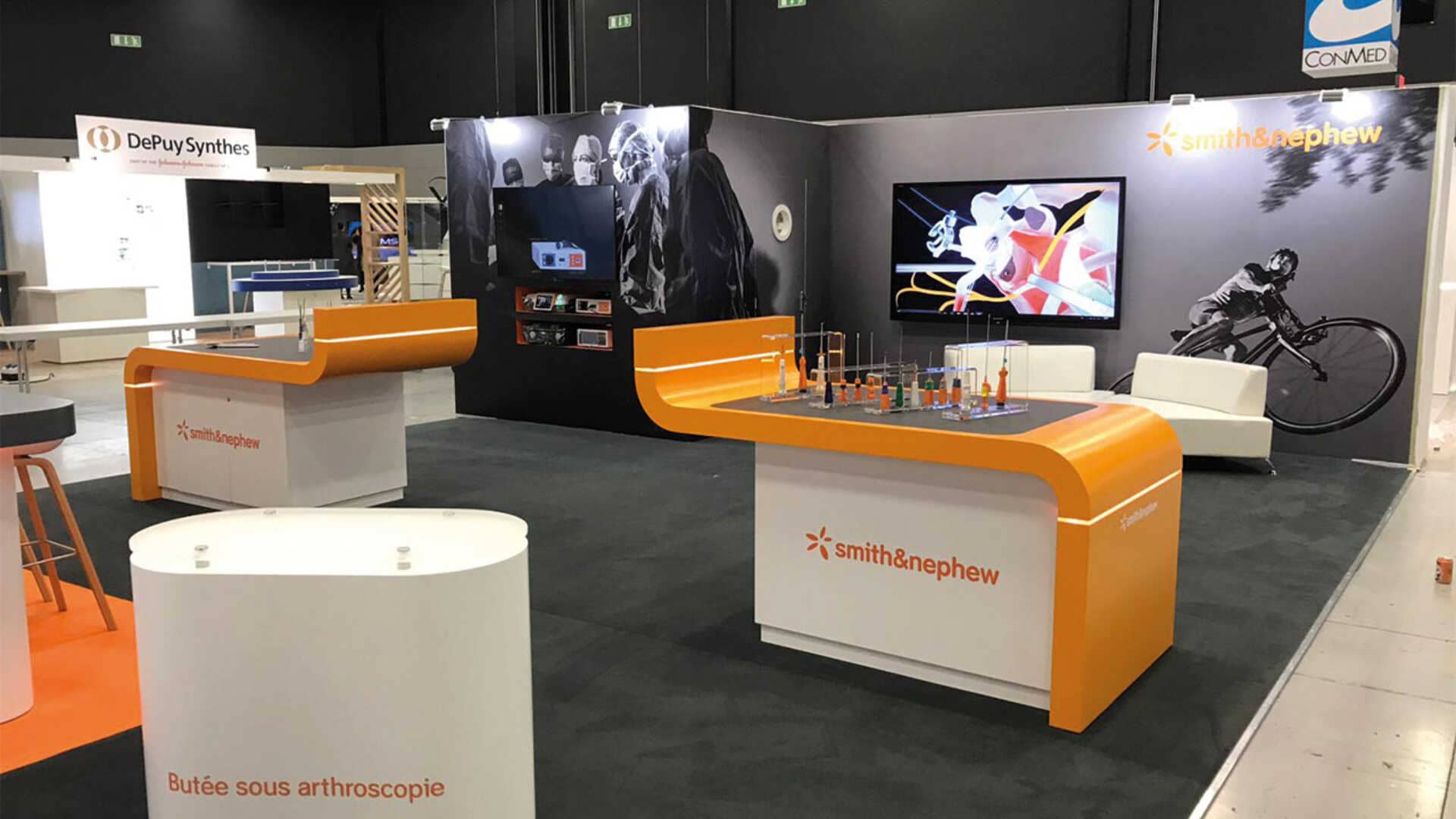 screens and information stands at a smith and nephew exhibition