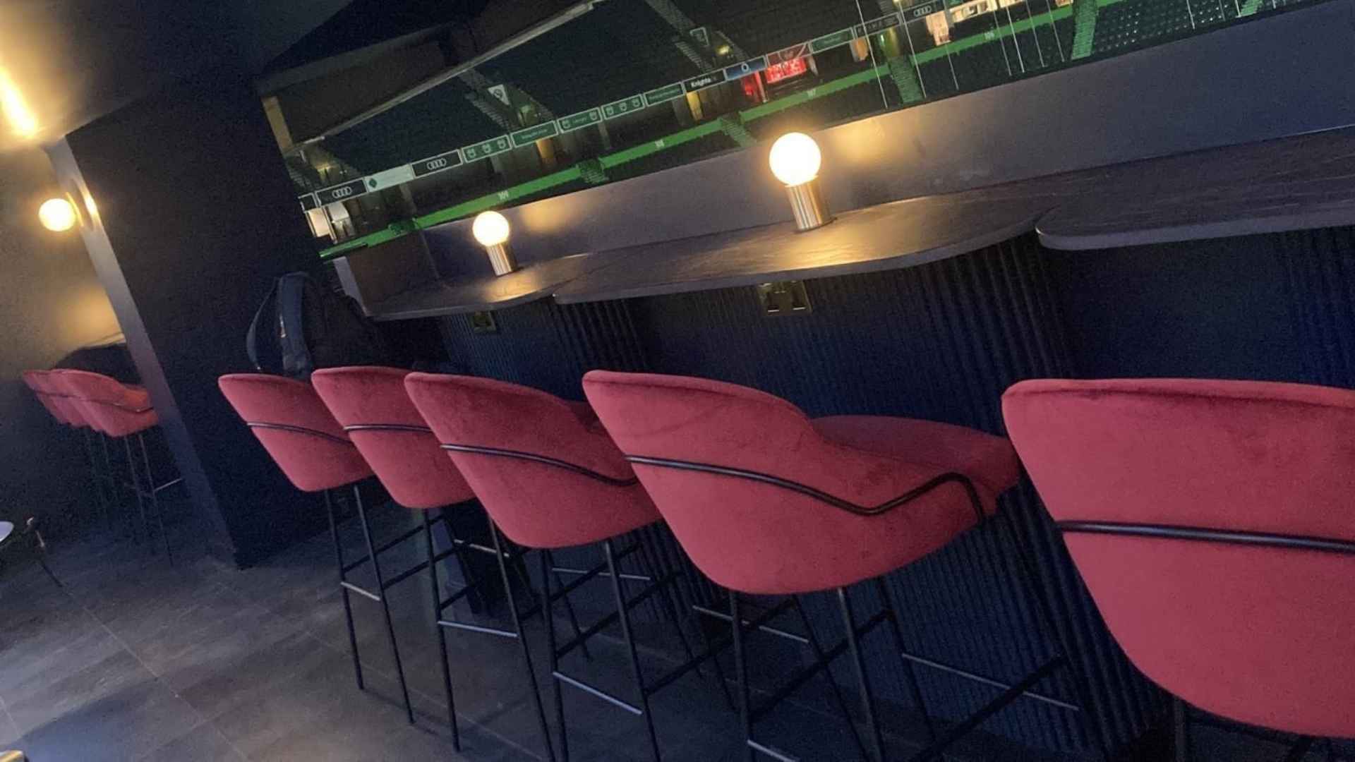 bespoke bar seats in the executive lounge at ao arena's viewing area